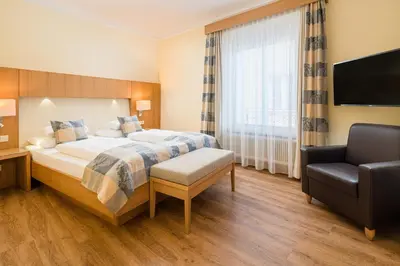 Ein Bett oder Betten in einem Zimmer der Unterkunft Hotel Weißes Kreuz