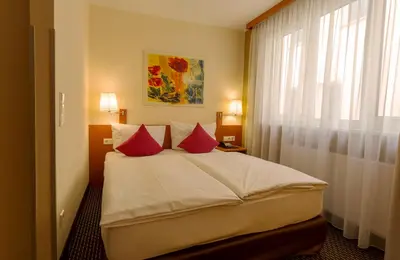 Ein Bett oder Betten in einem Zimmer der Unterkunft Central Hotel Löwen