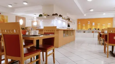 Ein Restaurant oder anderes Speiselokal in der Unterkunft Central Hotel Löwen
