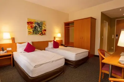 Ein Bett oder Betten in einem Zimmer der Unterkunft Central Hotel Löwen