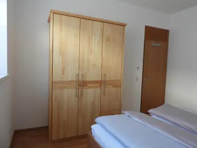 Ein Bett oder Betten in einem Zimmer der Unterkunft Ferienwohnung im Stern
