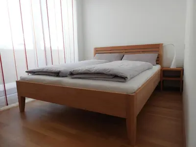 Ein Bett oder Betten in einem Zimmer der Unterkunft Ferienwohnung im Stern