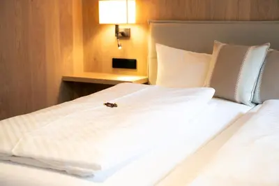 Ein Bett oder Betten in einem Zimmer der Unterkunft Genuss- & Aktivhotel Sonnenburg