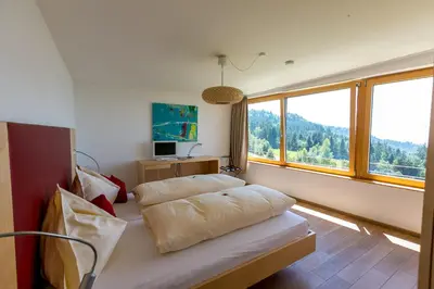 Ein Bett oder Betten in einem Zimmer der Unterkunft Hotel Schönblick