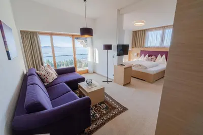 Ein Bett oder Betten in einem Zimmer der Unterkunft Hotel Schönblick