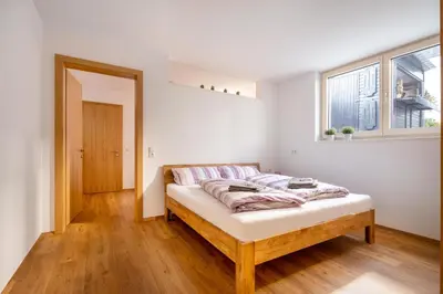 Ein Bett oder Betten in einem Zimmer der Unterkunft Ferienwohnung Valkastiel