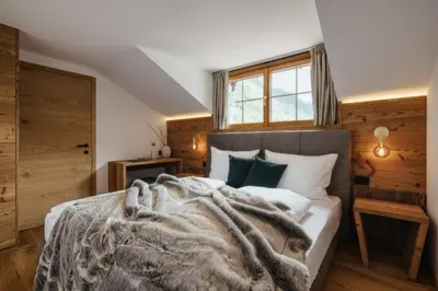 Ein Bett oder Betten in einem Zimmer der Unterkunft Ludwig‘s Mountain Lodges