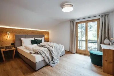 Ein Bett oder Betten in einem Zimmer der Unterkunft Ludwig‘s Mountain Lodges
