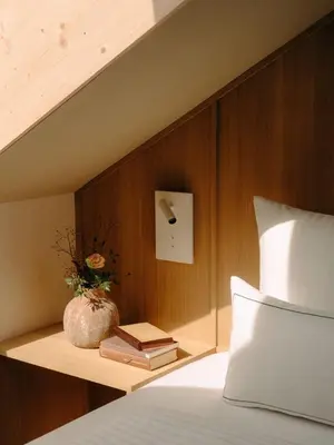 Ein Bett oder Betten in einem Zimmer der Unterkunft Hirschen - Fine Hotel, Restaurant & Spa
