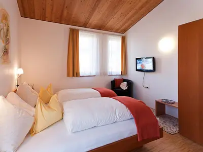 Ein Bett oder Betten in einem Zimmer der Unterkunft Appartements Dietrich