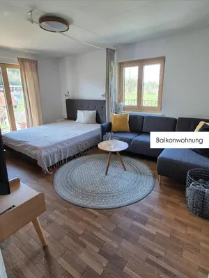 Ein Bett oder Betten in einem Zimmer der Unterkunft Ferienwohnung Tostner Burgblick