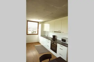 Küche/Küchenzeile in der Unterkunft Terrassenwohnung in prämierter Wohnanlage
