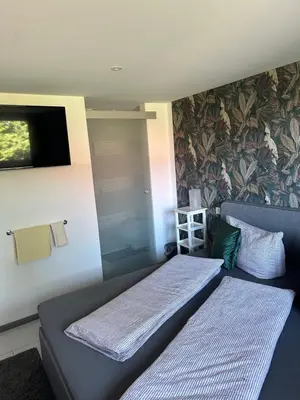Ein Bett oder Betten in einem Zimmer der Unterkunft Haus Geiger