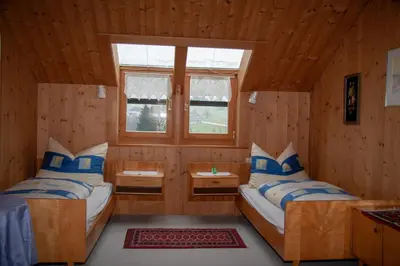 Ein Bett oder Betten in einem Zimmer der Unterkunft Haus Klebern, Egg - im Zentrum des Bregenzerwaldes