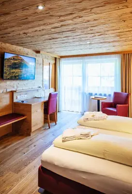 Ein Bett oder Betten in einem Zimmer der Unterkunft Natur-Genuss-Hotel Sonnasita