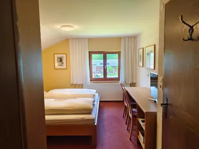Ein Bett oder Betten in einem Zimmer der Unterkunft Pension Zita