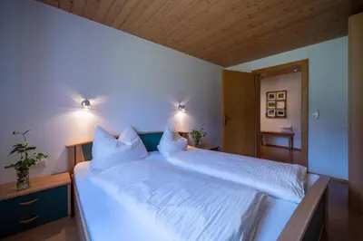 Ein Bett oder Betten in einem Zimmer der Unterkunft Ferienbauernhof Oberhauser