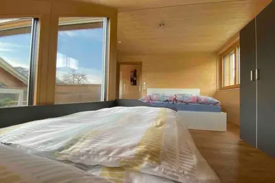 Ein Bett oder Betten in einem Zimmer der Unterkunft Rosenhaus 1