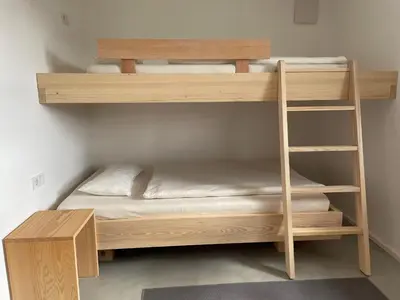 Ein Bett oder Betten in einem Zimmer der Unterkunft Bregenzerwaldblick