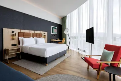 Ein Bett oder Betten in einem Zimmer der Unterkunft Four Points by Sheraton Panoramahaus Dornbirn