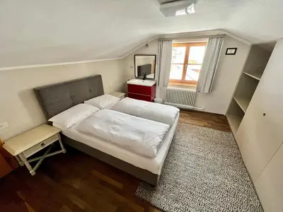 Ein Bett oder Betten in einem Zimmer der Unterkunft Lech Hostel