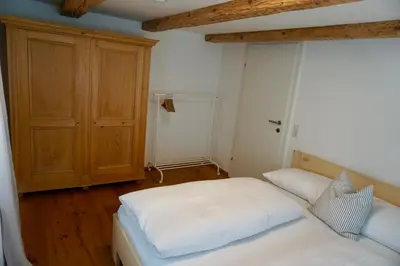 Ein Bett oder Betten in einem Zimmer der Unterkunft Beeindruckende Wohnung im Rheintal