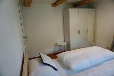 Ein Bett oder Betten in einem Zimmer der Unterkunft Beeindruckende Wohnung im Rheintal
