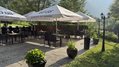 Ein Garten an der Unterkunft Gasthof Paluda - Pizzeria