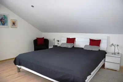 Ein Bett oder Betten in einem Zimmer der Unterkunft Schottar FeWo MG 07