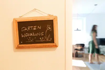 Ein Zertifikat, Auszeichnung, Logo oder anderes Dokument, das in der Unterkunft Rotes Haus Bregenz Garten Wohnung ausgestellt ist