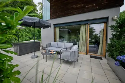 Ein Garten an der Unterkunft Charmantes Apartment in Bregenz - perfekt für Aktive & Genießer