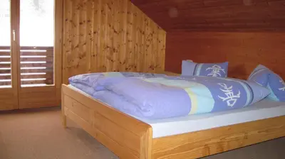 Ein Bett oder Betten in einem Zimmer der Unterkunft CHALET 294