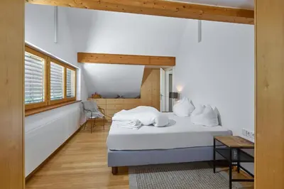 Ein Bett oder Betten in einem Zimmer der Unterkunft Außergewöhnliches Loft am Pfänderhang mit Seeblick