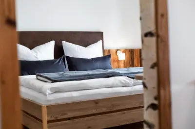 Ein Bett oder Betten in einem Zimmer der Unterkunft Haus Fellhorn - Ferienwohnungen