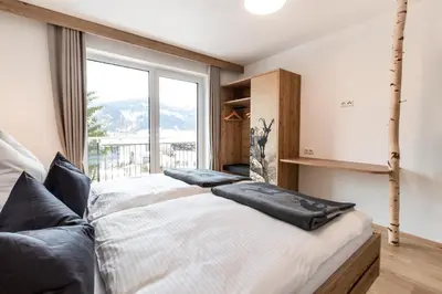 Ein Bett oder Betten in einem Zimmer der Unterkunft Haus Fellhorn - Ferienwohnungen