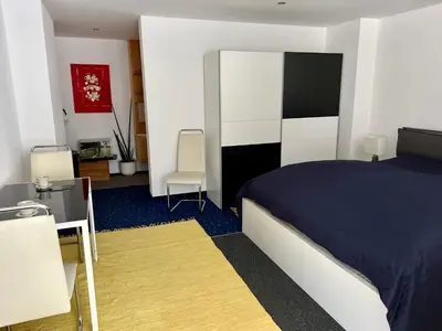 Ein Bett oder Betten in einem Zimmer der Unterkunft Glads Apartment