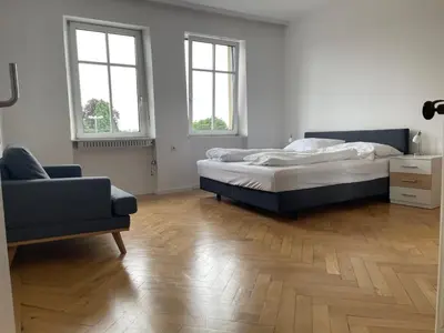 Ein Bett oder Betten in einem Zimmer der Unterkunft Apartments am Bodensee