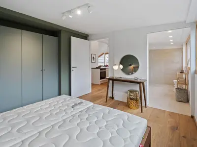 Ein Bett oder Betten in einem Zimmer der Unterkunft Traumhafte Stadtwohnung mit Bodensee-Blick