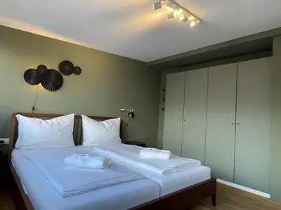 Ein Bett oder Betten in einem Zimmer der Unterkunft Traumhafte Stadtwohnung mit Bodensee-Blick