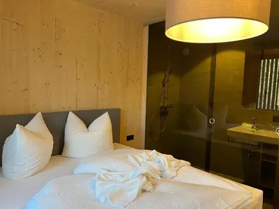 Ein Bett oder Betten in einem Zimmer der Unterkunft SMART Apartments Mellau