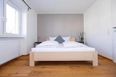 Ein Bett oder Betten in einem Zimmer der Unterkunft Terrassenwohnung in Götzis