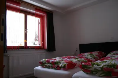 Ein Bett oder Betten in einem Zimmer der Unterkunft Landhaus Waldblick