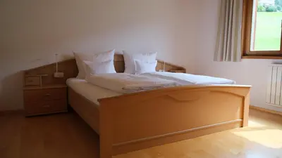 Ein Bett oder Betten in einem Zimmer der Unterkunft Bizau 361