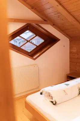 Ein Bett oder Betten in einem Zimmer der Unterkunft NigschHof