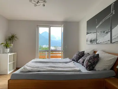 Ein Bett oder Betten in einem Zimmer der Unterkunft Appartement Schillerkopf