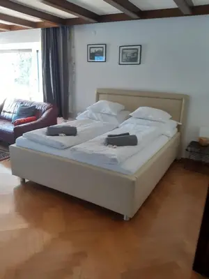 Ein Bett oder Betten in einem Zimmer der Unterkunft Ferienwohnung Bodenseeblick