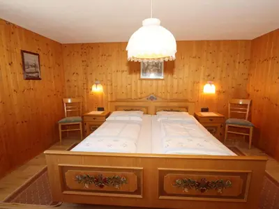 Ein Bett oder Betten in einem Zimmer der Unterkunft Ferienhaus Türtscher 2