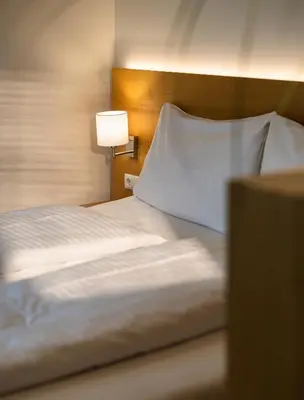 Ein Bett oder Betten in einem Zimmer der Unterkunft OXA - Easy Escape - Bed & Breakfast
