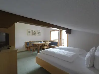 Ein Bett oder Betten in einem Zimmer der Unterkunft Ferienhaus Bergland
