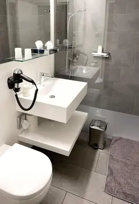 Ein Badezimmer in der Unterkunft Apartmenthaus Anna mit Self-Check-In und 24h Support